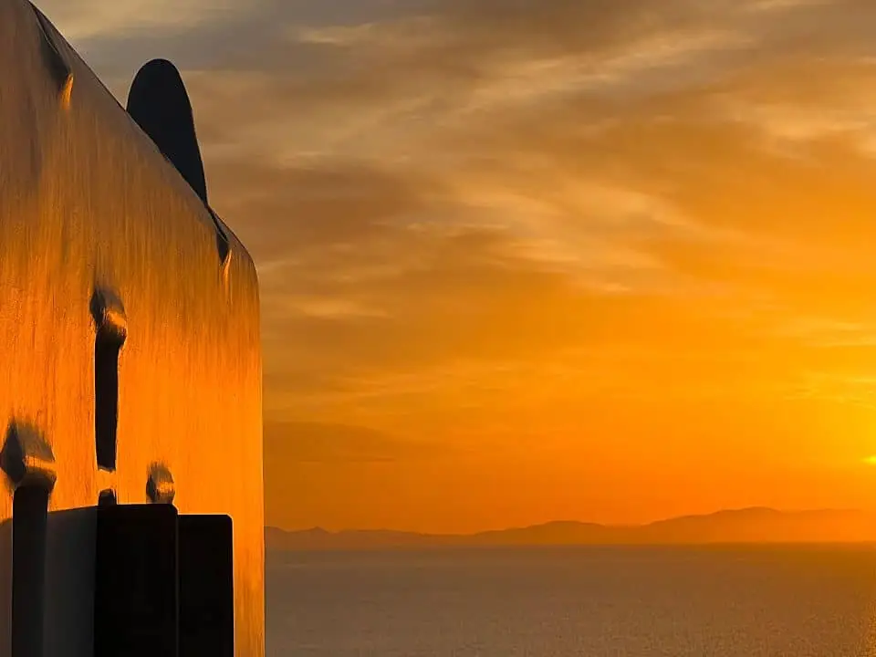 Sunset over the sea view from Nomia Mykonos Hotel