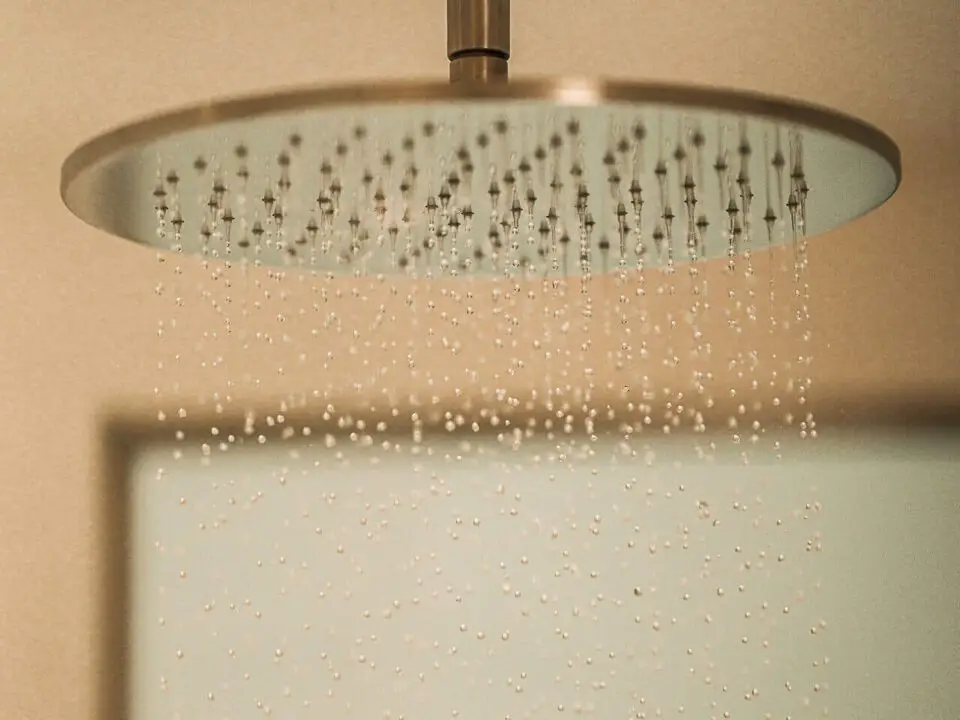 Junior Suite with Outdoor Hot Tub: Rain showerhead spraying water from a ceiling mount